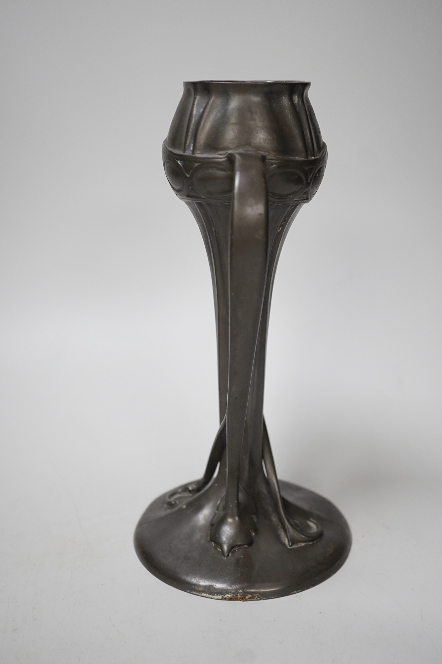 A Tudric pewter vase, model no. 029, 25cm tall